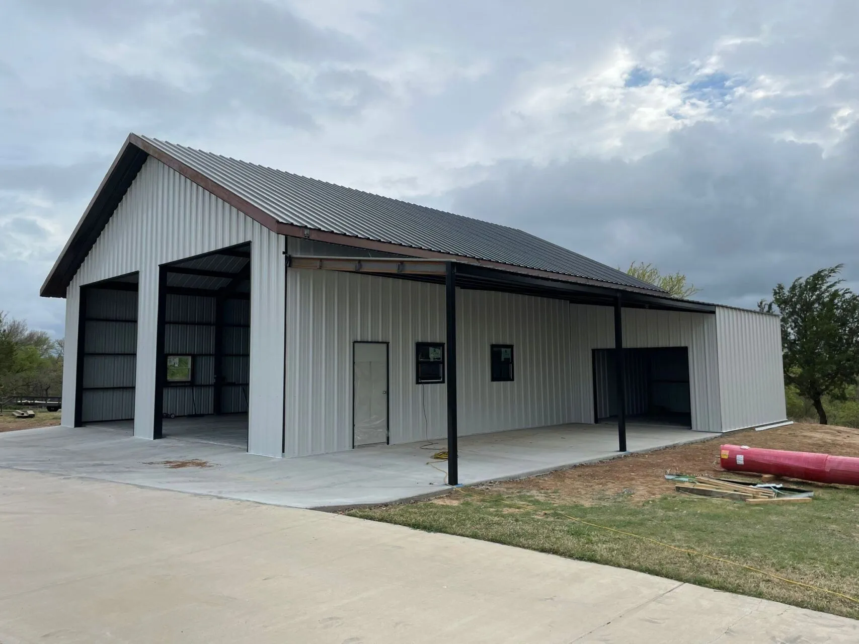 Cover 40x50 Weld Up Metal Garage in Weatherford, TX.