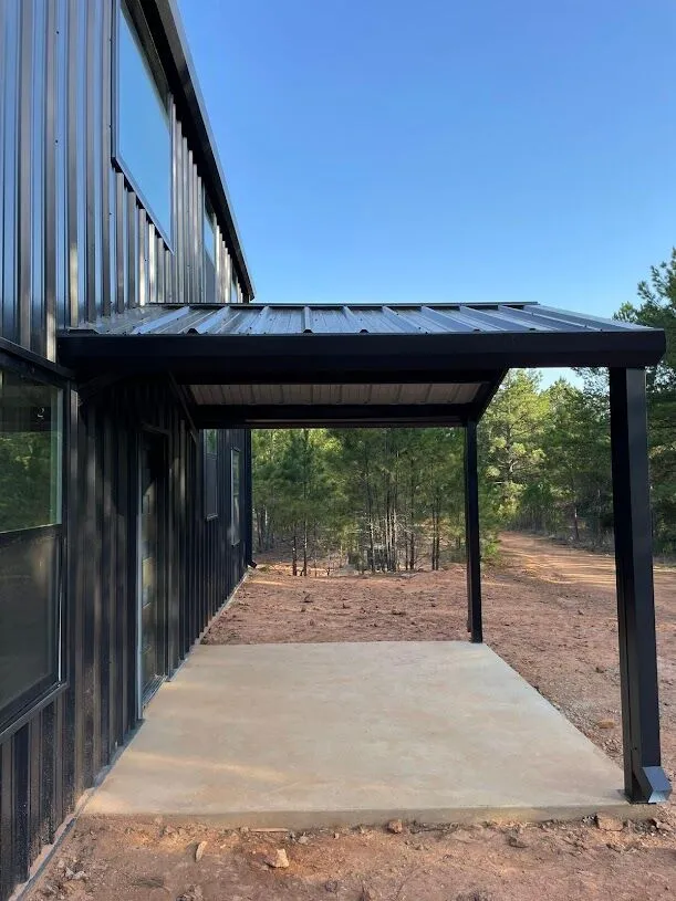 40x60 Custom Black Steel Building in Avinger, TX. 40x60 Custom Black Steel Building in Avinger, TX.