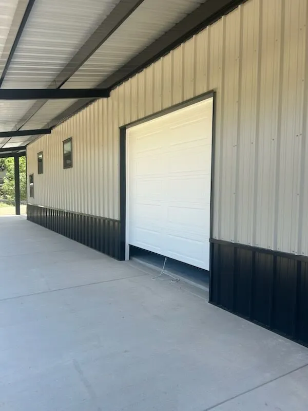 40x75 Metal Workshop with Custom Porch in Medina, TX. 40x75 Metal Workshop with Custom Porch in Medina, TX.