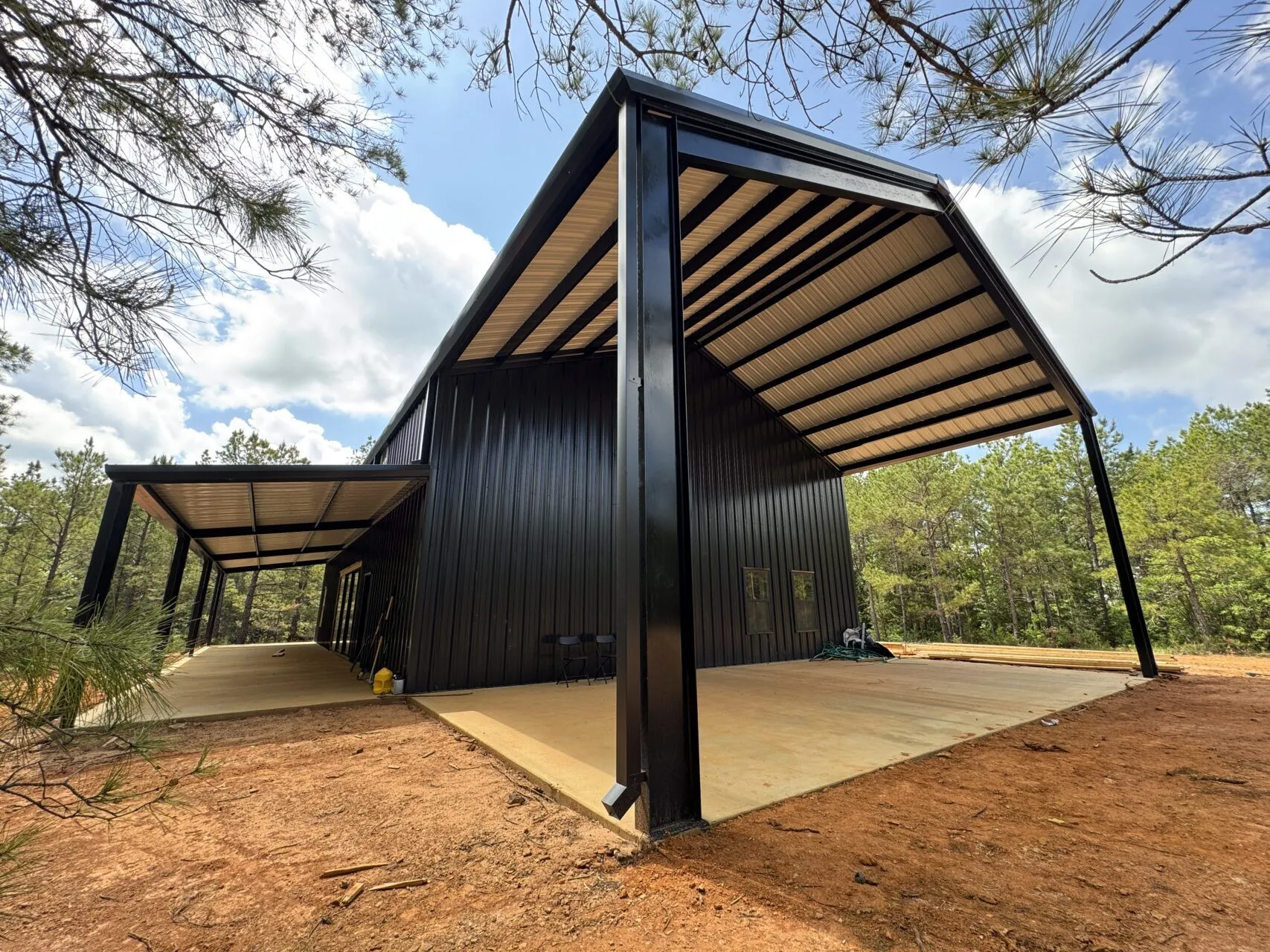 40x60 Custom Black Steel Building in Avinger, TX.