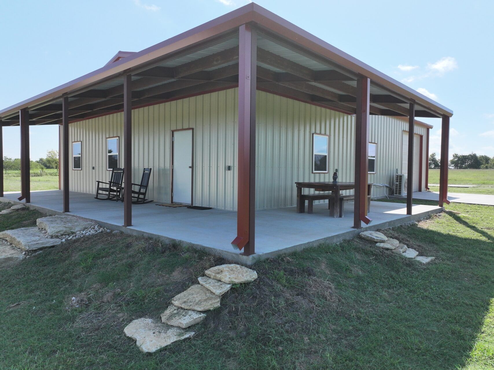 40x50 Red Iron Steel Building with Wraparound Porch in Kaufman, TX. 40x50 Red Iron Steel Building with Wraparound Porch in Kaufman, TX.