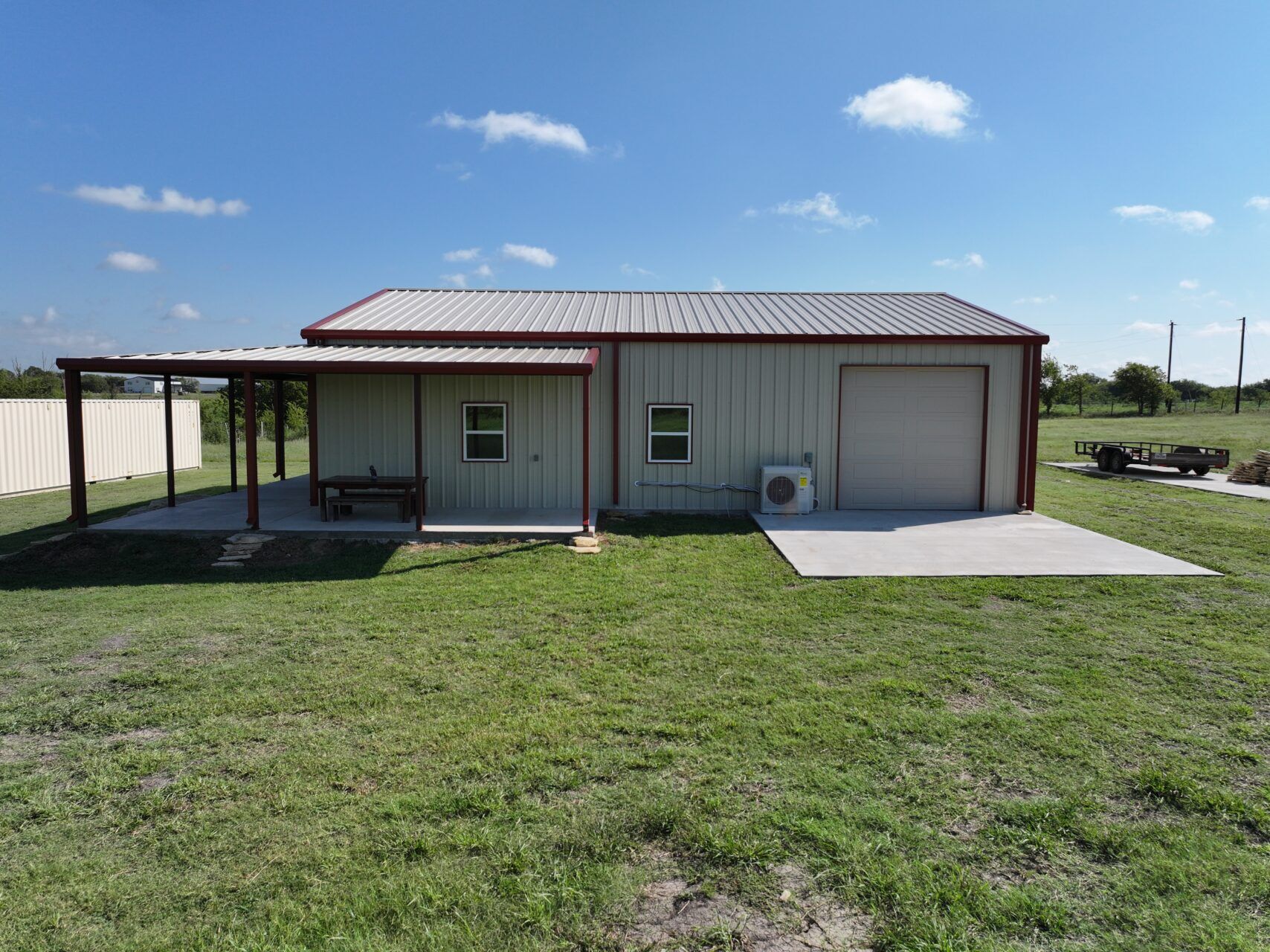 40x50 Red Iron Steel Building with Wraparound Porch in Kaufman, TX. 40x50 Red Iron Steel Building with Wraparound Porch in Kaufman, TX.