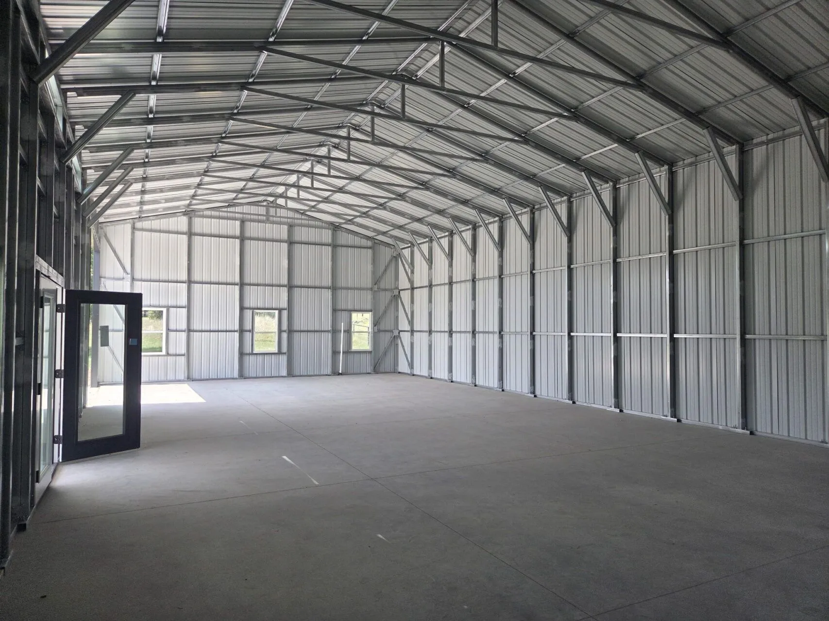 30x60 Custom Metal Building with Cedar Porch in Prosper, TX. 30x60 Custom Metal Building with Cedar Porch in Prosper, TX.