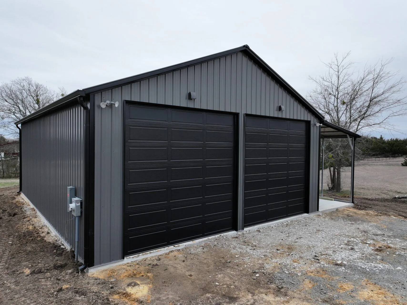 30x40 Metal Building with Custom Lean-to Porch in Ennis, TX.