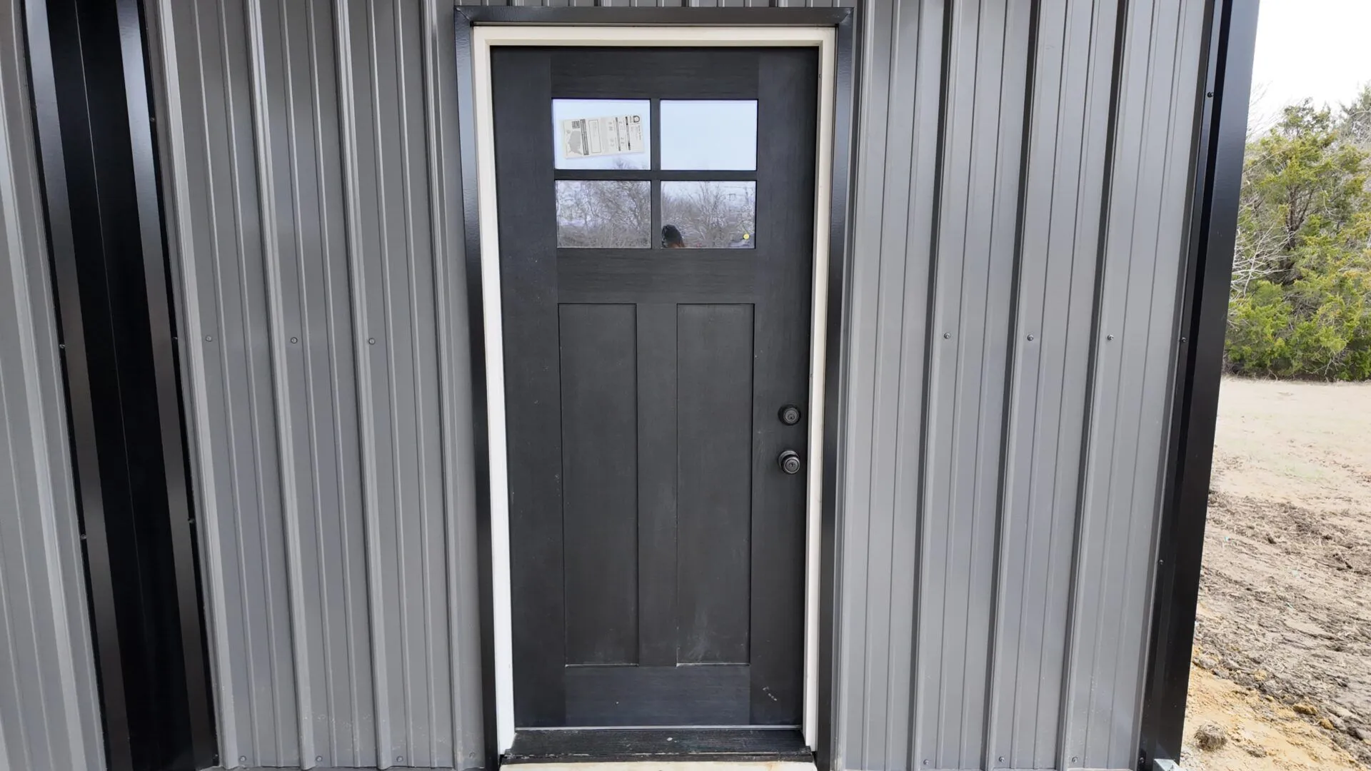 30x40 Metal Workshop with Custom Lean-to in Ennis, TX. 30x40 Metal Building with Custom Lean-to Porch in Ennis, TX.