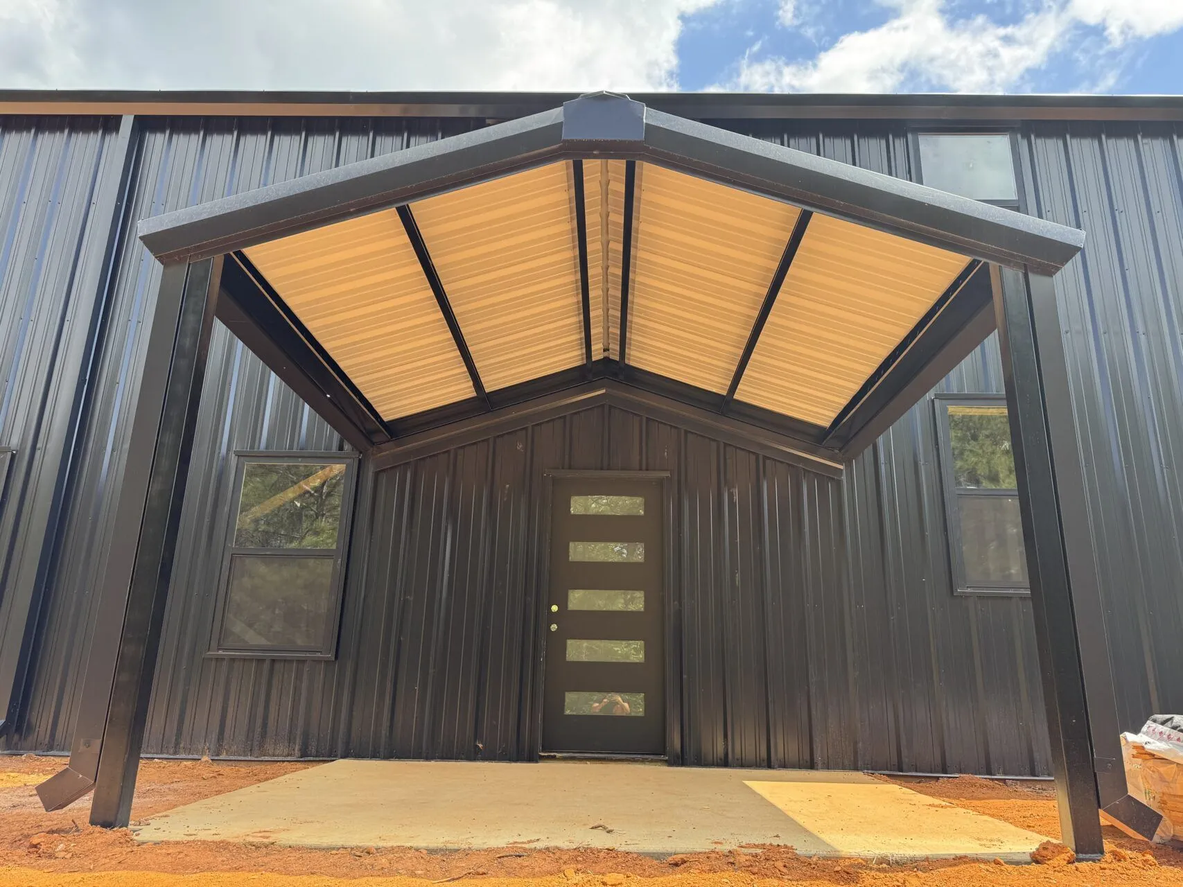 40x60 Custom Black Steel Building in Avinger, TX. 40x60 Custom Black Steel Building in Avinger, TX.