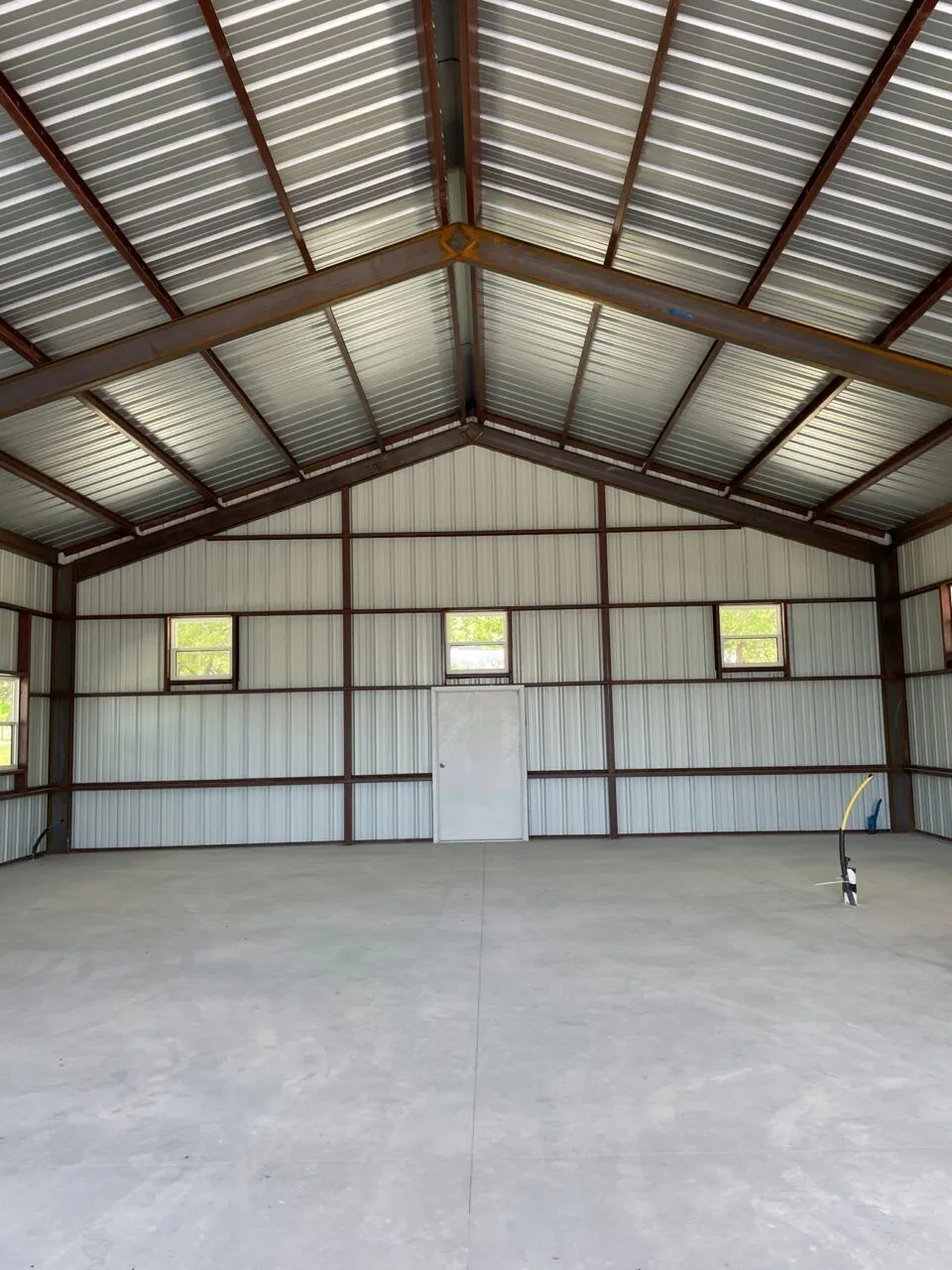 40x75 Metal Workshop with Custom Porch in Medina, TX. 40x75 Metal Workshop with Custom Porch in Medina, TX.