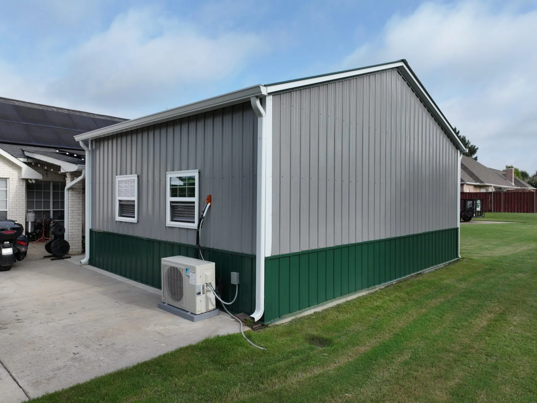 26x20 Grey and Green Tubular Steel Building in Red Oak, TX. 26x20 Grey and Green Tubular Steel Building in Red Oak, TX.