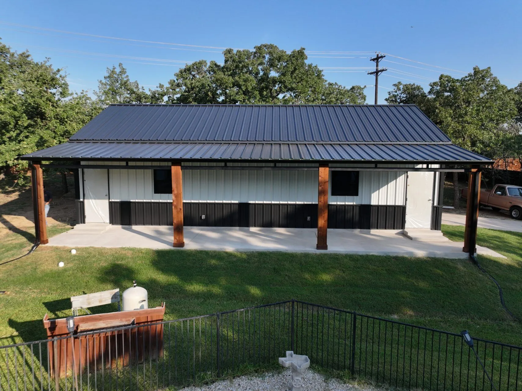24x45 Custom Metal Garage with Cedar Accents in Flower Mound, TX. 24x45 Custom Metal Garage with Cedar Accents in Flower Mound, TX.