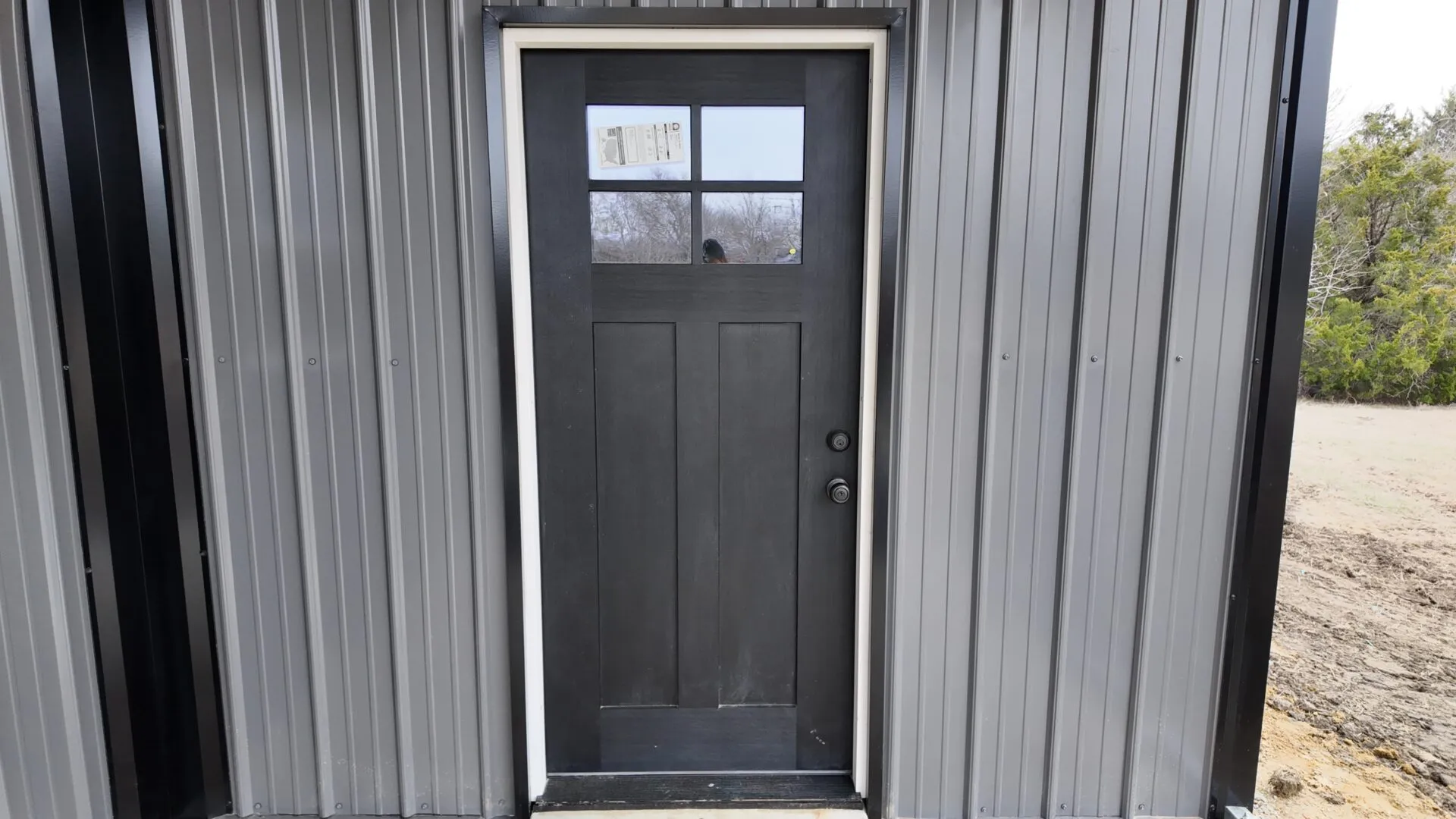 30x40 Metal Workshop with Custom Lean-to in Ennis, TX. 30x40 Metal Building with Custom Lean-to Porch in Ennis, TX.