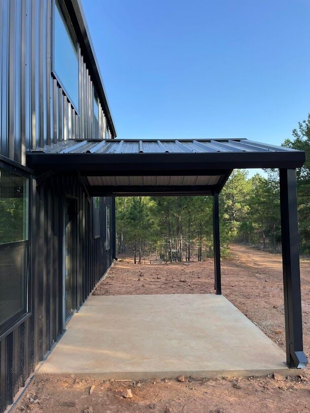 40x60 Custom Black Steel Building in Avinger, TX. 40x60 Custom Black Steel Building in Avinger, TX.