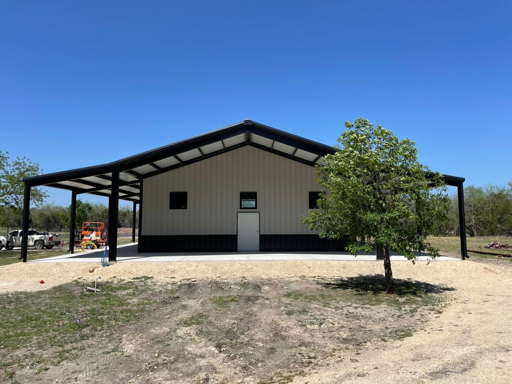 40x75 Metal Workshop with Custom Porch in Medina, TX. 40x75 Metal Workshop with Custom Porch in Medina, TX.
