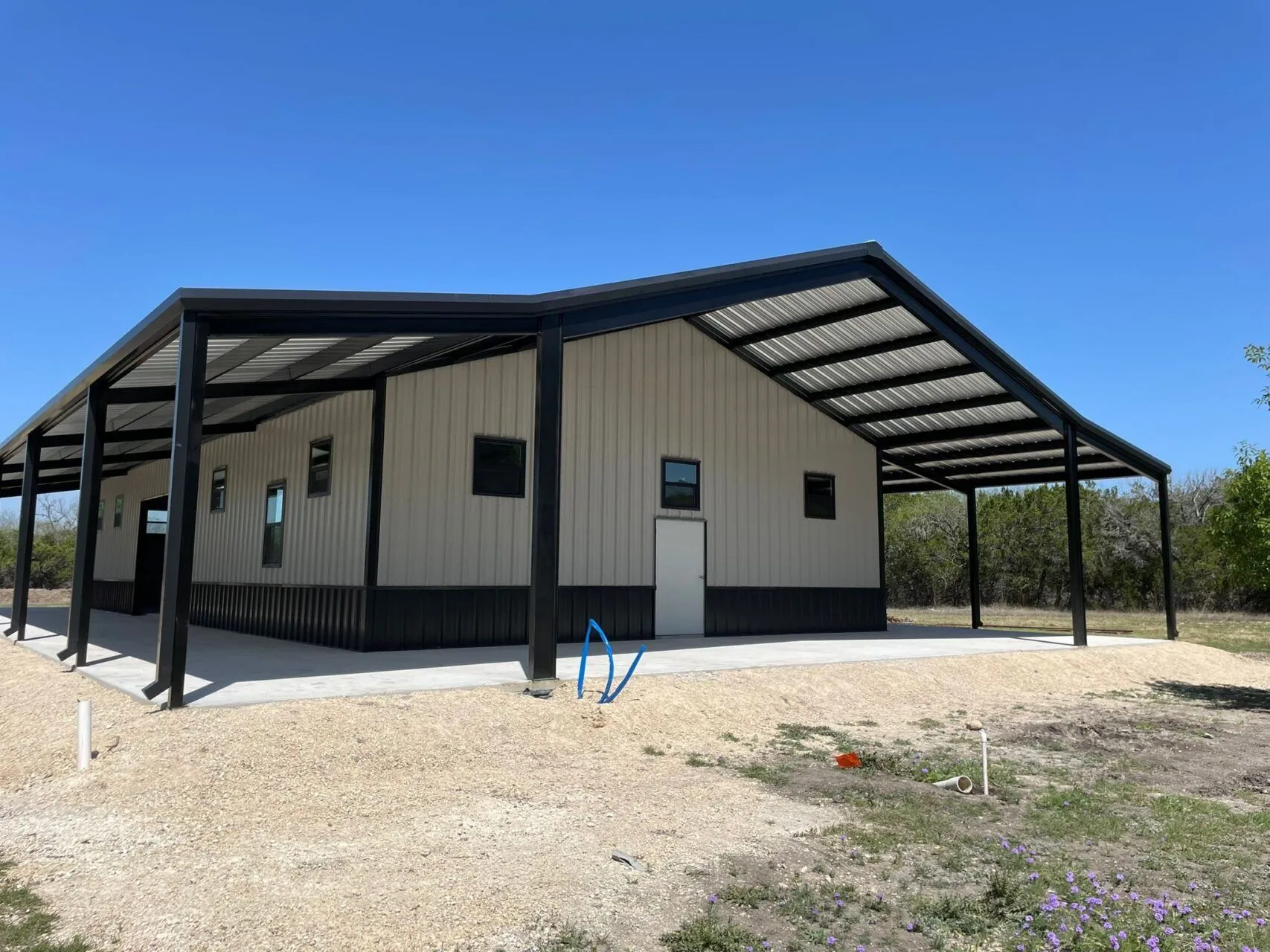 40x75 Metal Workshop with Custom Porch in Medina, TX. 40x75 Metal Workshop with Custom Porch in Medina, TX.