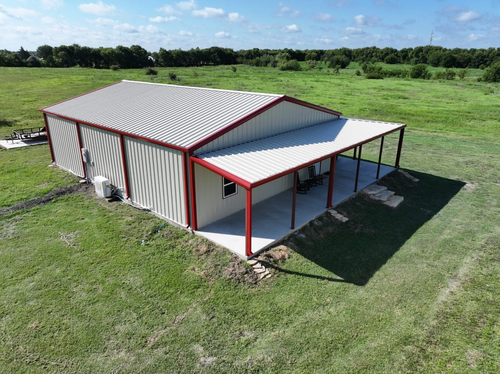40x50 Red Iron Steel Building with Wraparound Porch in Kaufman, TX. 40x50 Red Iron Steel Building with Wraparound Porch in Kaufman, TX.
