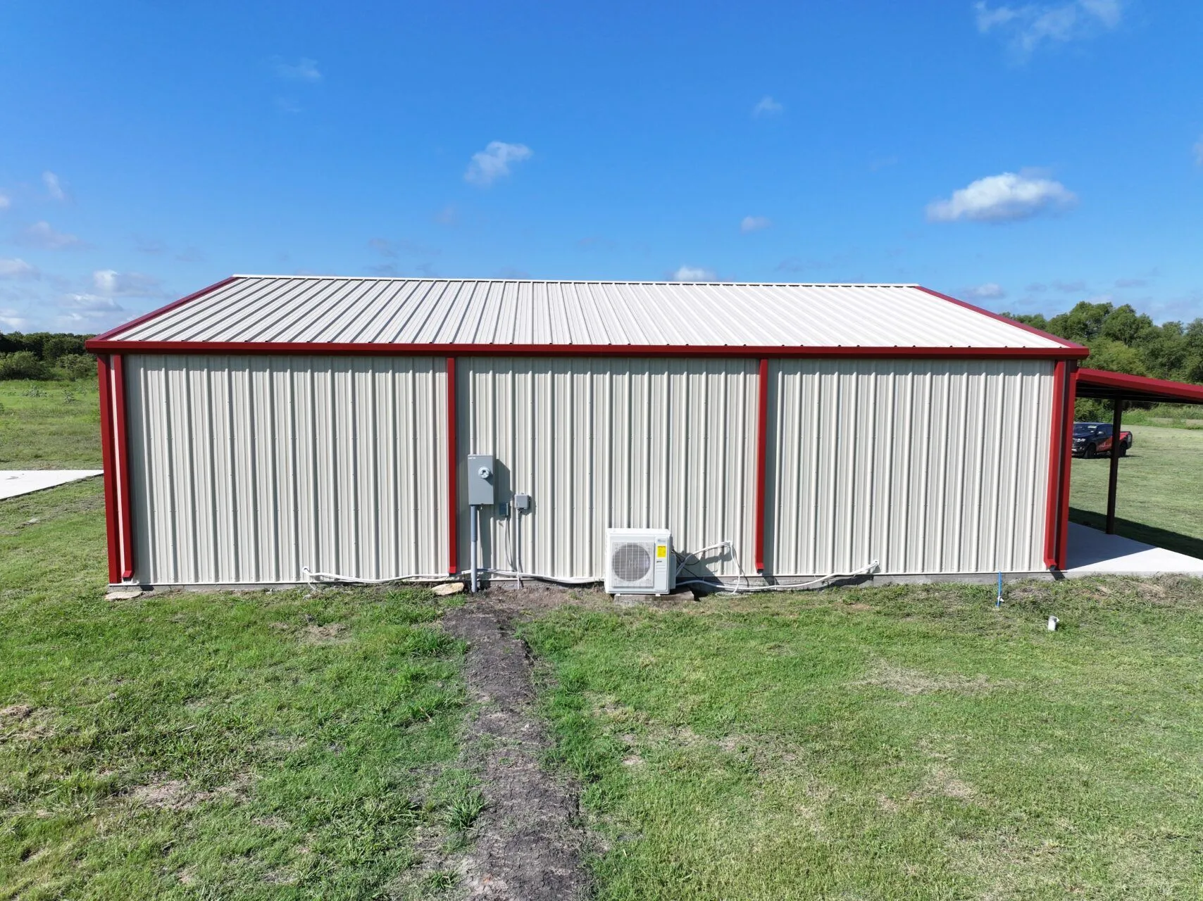 40x50 Red Iron Steel Building with Wraparound Porch in Kaufman, TX. 40x50 Red Iron Steel Building with Wraparound Porch in Kaufman, TX.