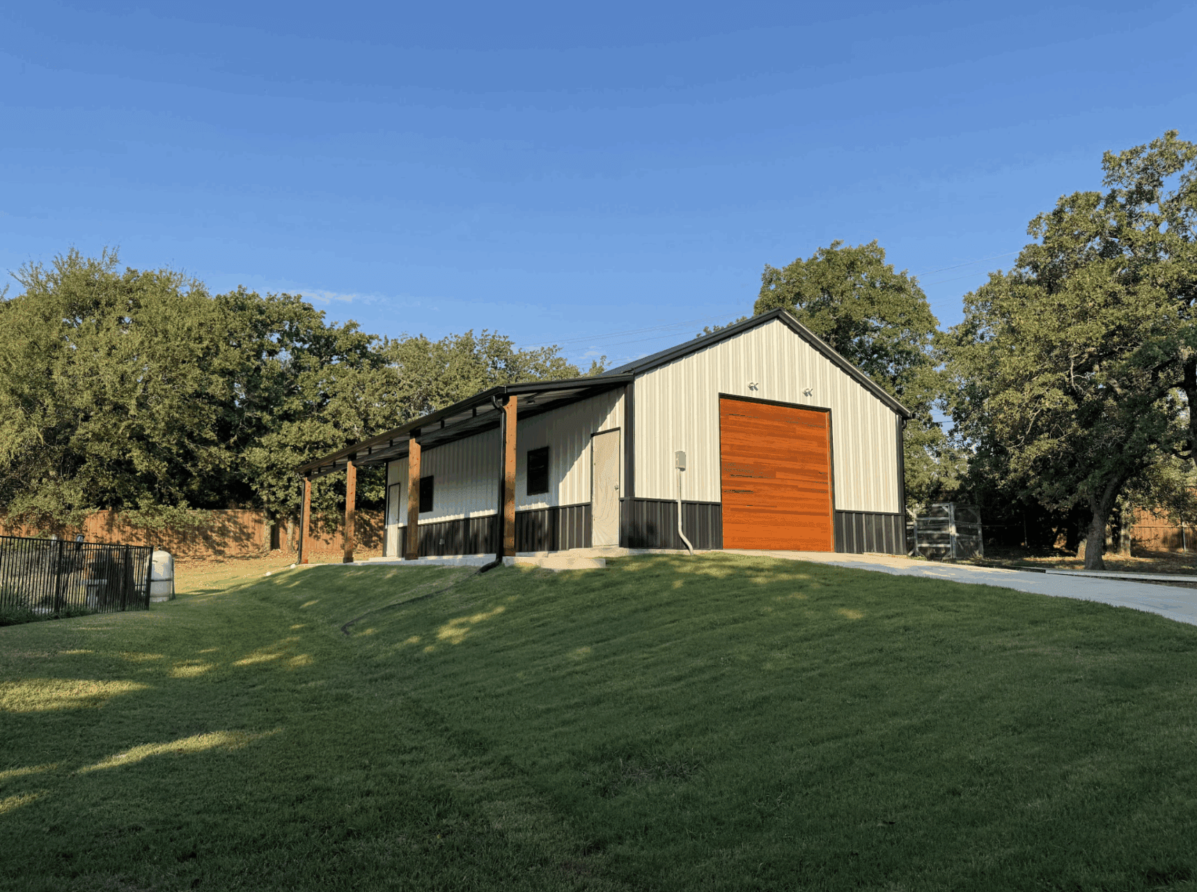 24x45 Custom Metal Garage with Cedar Accents in Flower Mound, TX. 24x45 Custom Metal Garage with Cedar Accents in Flower Mound, TX.