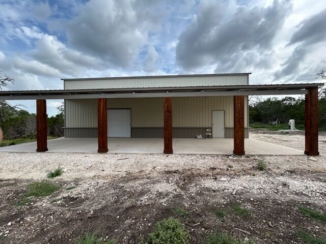 30x50 Two Car Metal Garage with Side Porch in Center Point, TX. 30x50 Two Car Metal Garage with Side Porch in Center Point, TX.