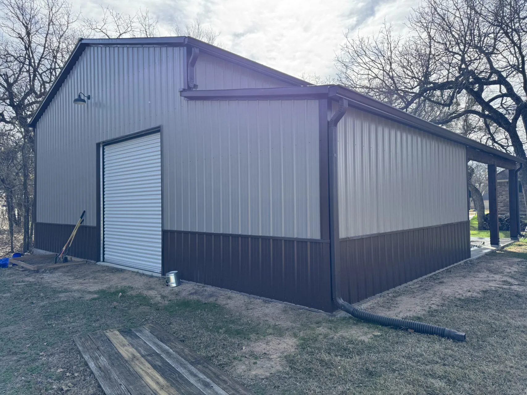 30x40 Metal Garage with Cedar Lean-to Posts in Weatherford, TX. 30x40 Metal Garage with Cedar Lean-to Posts in Weatherford, TX.