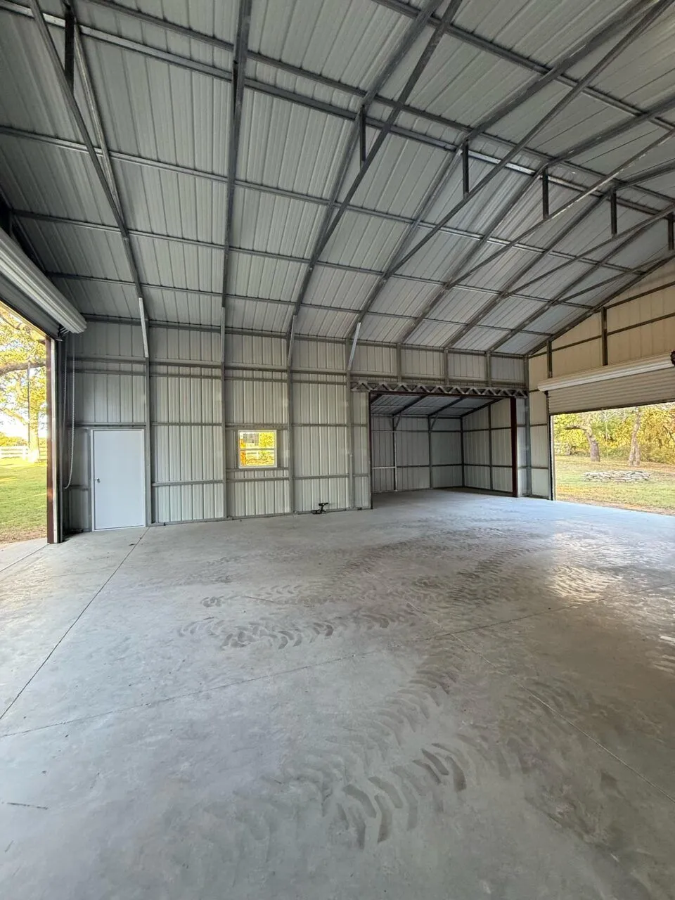 30x40 Metal Garage with Cedar Lean-to Posts in Weatherford, TX. 30x40 Metal Garage with Cedar Lean-to Posts in Weatherford, TX.