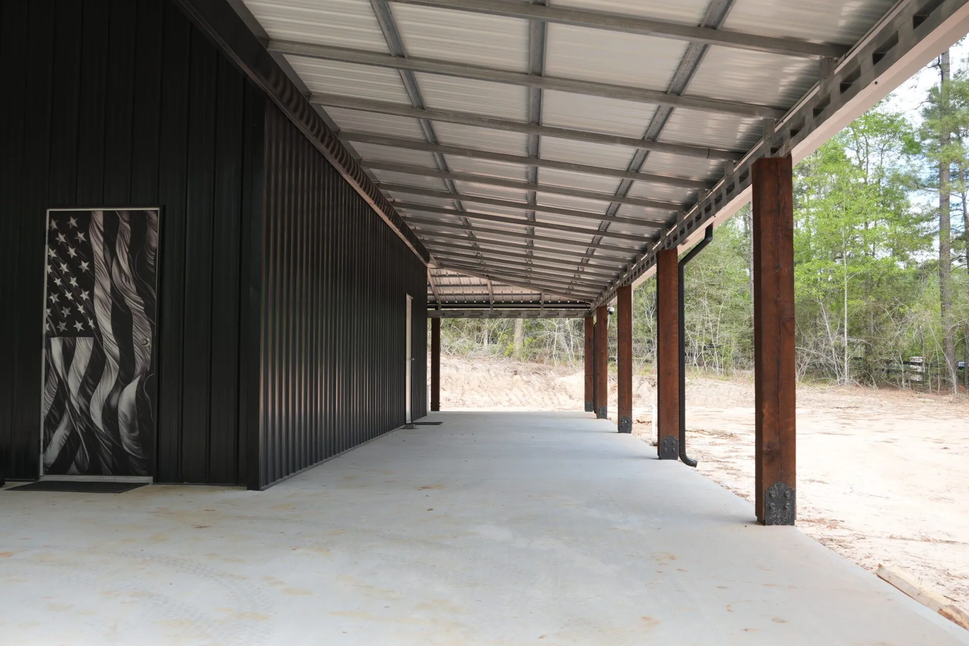 30x60 Custom Blacked-Out Shop with Wrap-around Porch in Montgomery, TX. 30x60 Custom Blacked-Out Shop with Wrap-around Porch in Montgomery, TX.
