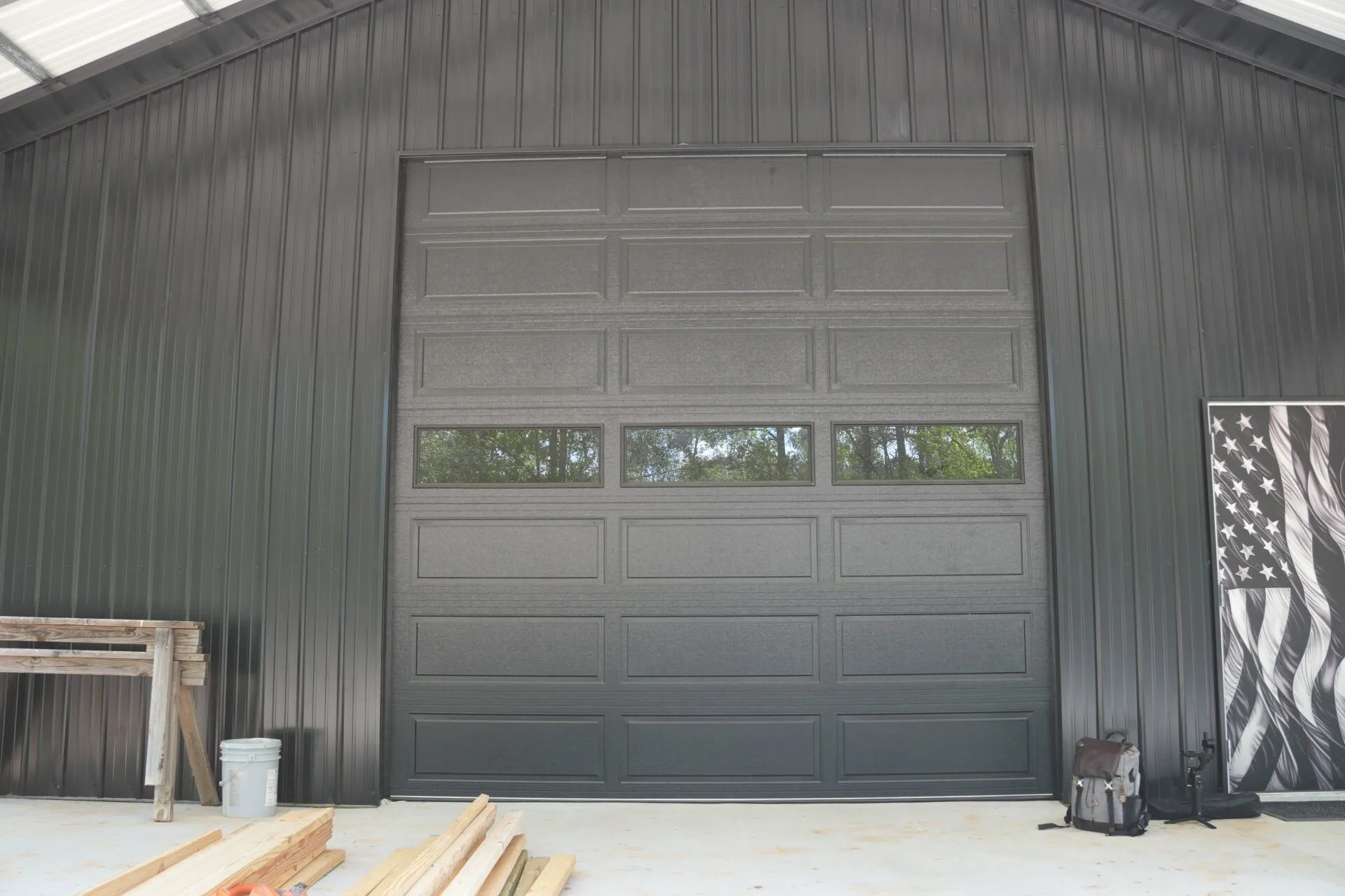 30x60 Custom Blacked-Out Shop with Wrap-around Porch in Montgomery, TX. 30x60 Custom Blacked-Out Shop with Wrap-around Porch in Montgomery, TX.