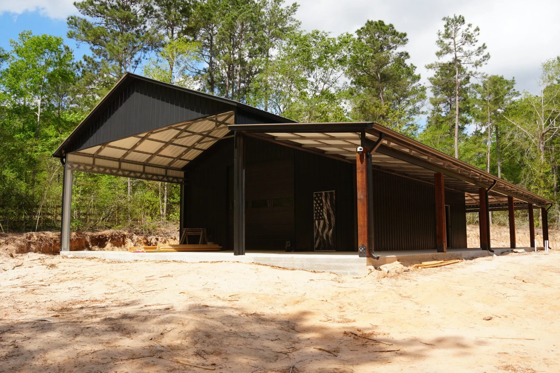 30x60 Custom Blacked-Out Shop with Wrap-around Porch in Montgomery, TX. 30x60 Custom Blacked-Out Shop with Wrap-around Porch in Montgomery, TX.