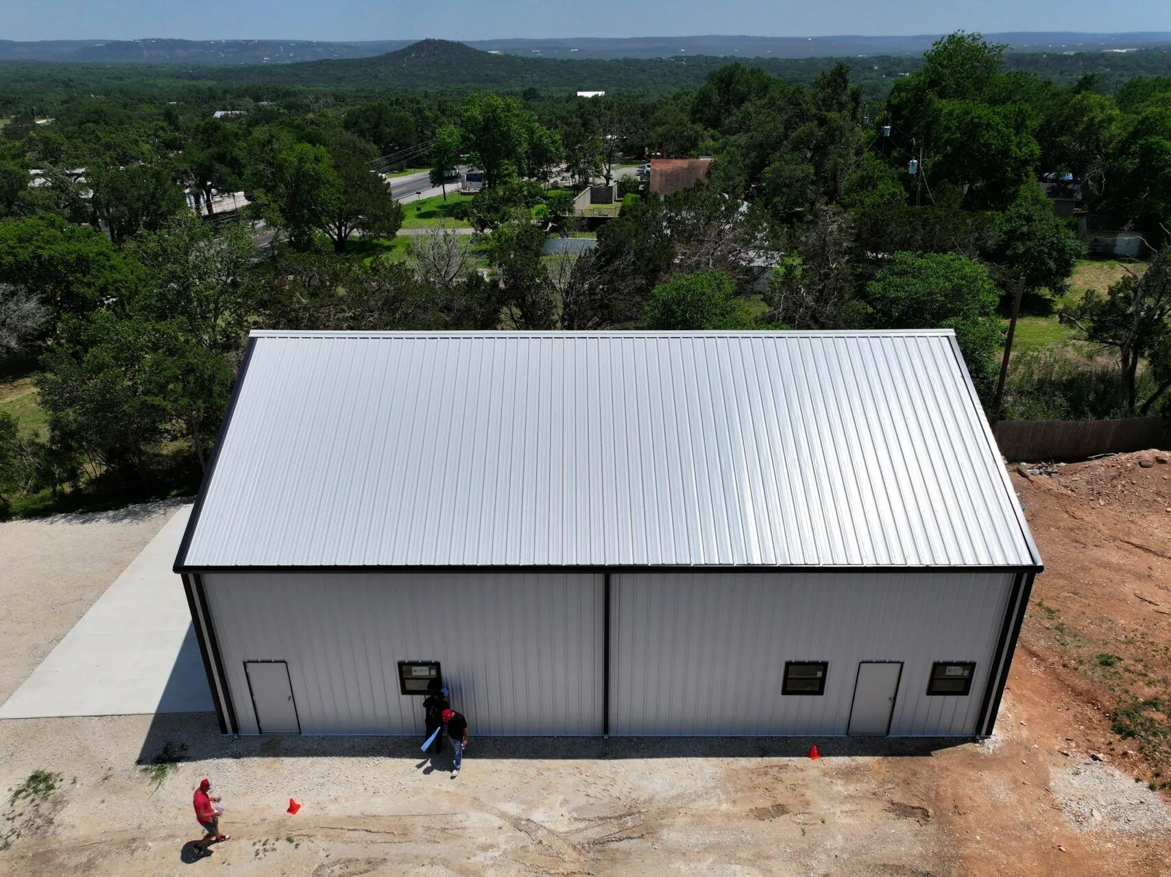 40x60 Red Iron Metal Garage in Wimberley, Texas.