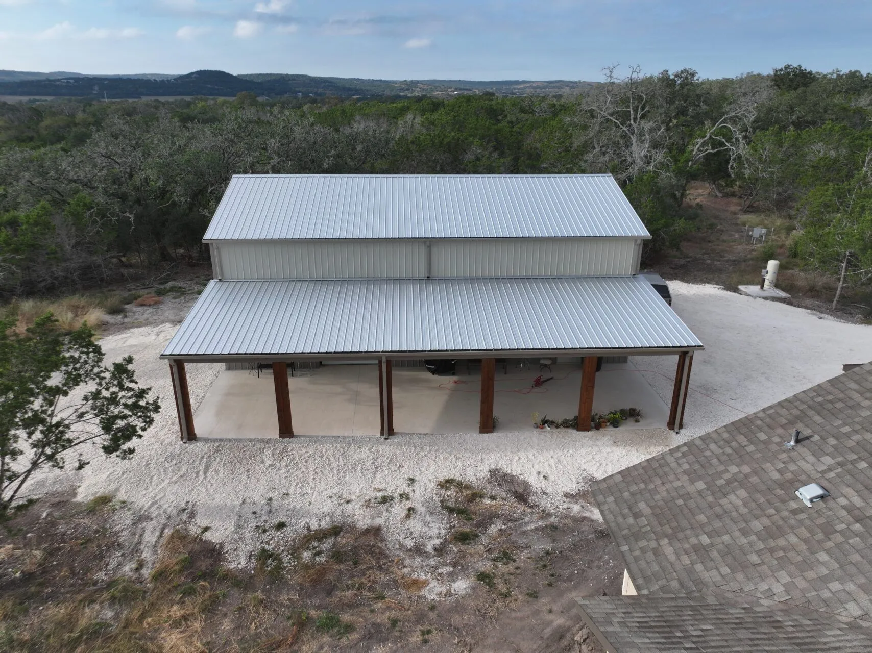 30x50 Two Car Metal Garage with Side Porch in Center Point, TX. 30x50 Two Car Metal Garage with Side Porch in Center Point, TX.