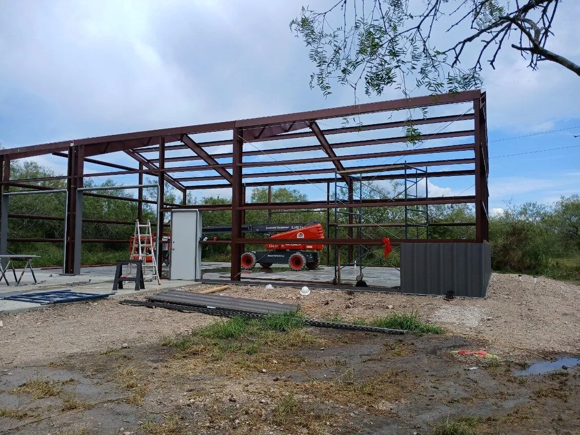 40x60 Red Iron Metal Building in Skidmore, Texas 7838 40x60 Metal Garage with Concrete