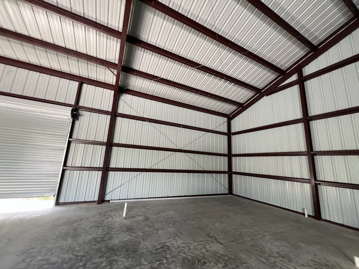 40x60 Red Iron Metal Building in Skidmore, Texas 7838 40x60 Metal Garage with Concrete