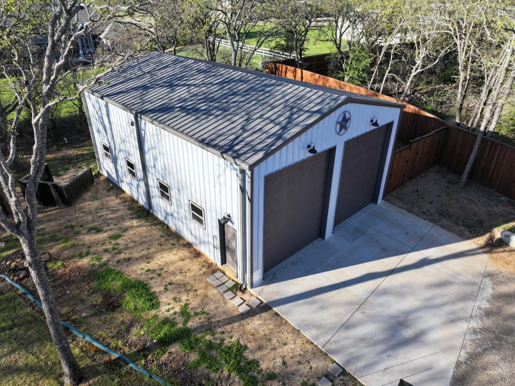 30x43 Red Iron Workshop Building in Flower Mound, TX. 30x43 Red Iron Workshop Building in Flower Mound, TX.