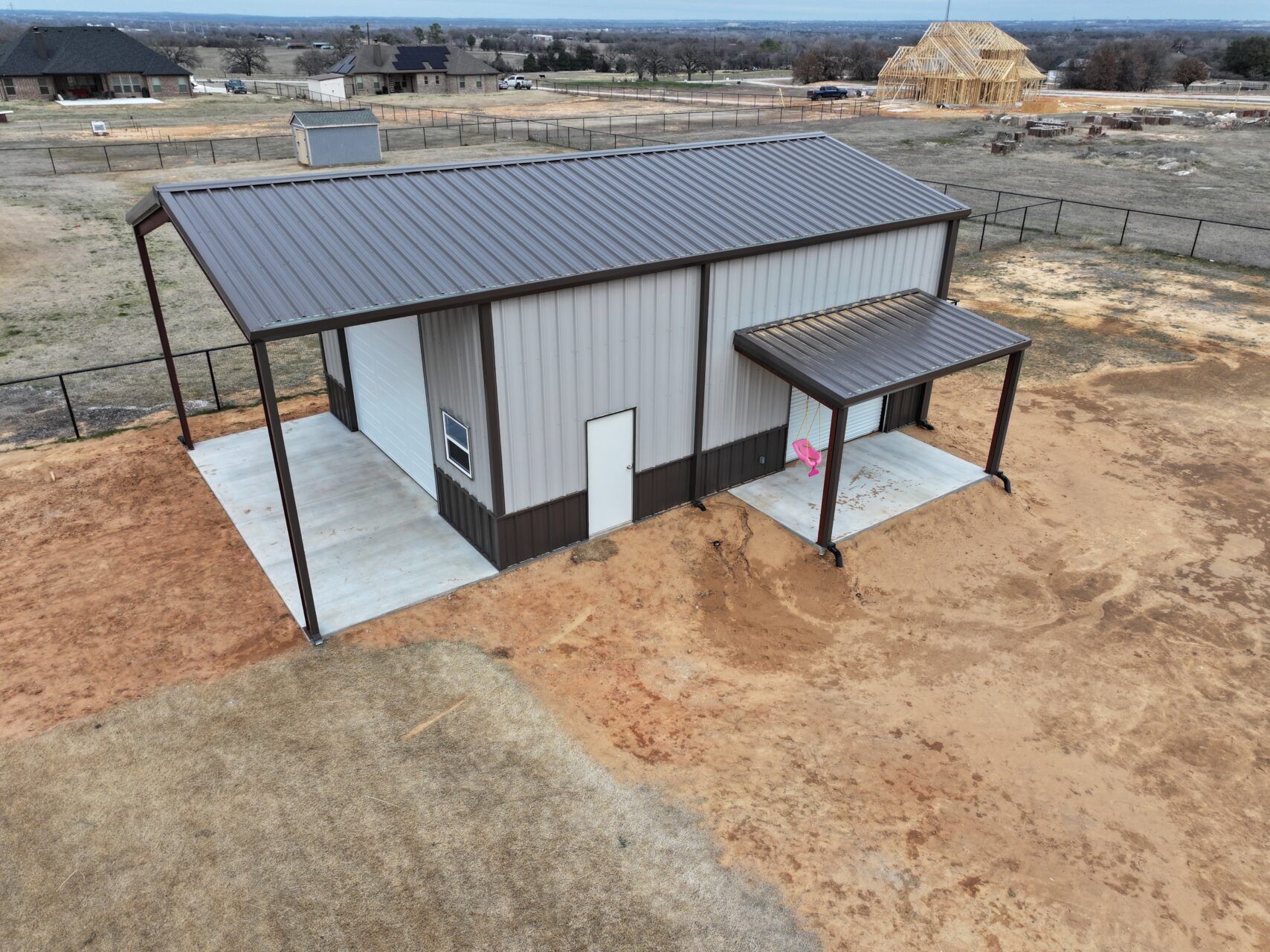 26x45 Red Iron Steel Building with Porch in Boyd, TX. 26x45 Red Iron Steel Building with Porch in Boyd, TX.