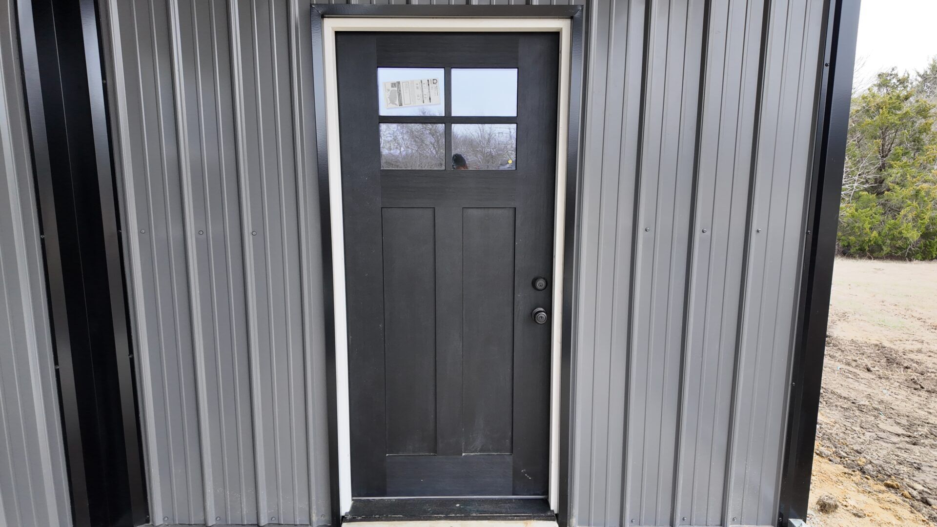 30x40 Metal Workshop with Custom Lean-to in Ennis, TX. 30x40 Metal Building with Custom Lean-to Porch in Ennis, TX.