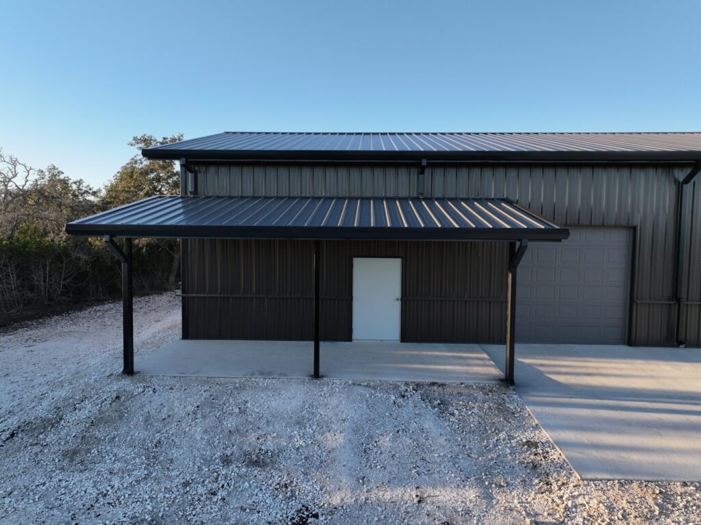 40x100 Custom Weld Up Red Iron Steel Garage in Kerrville, Texas.