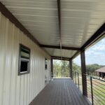 30x40 Custom Metal Building with Steel Balcony, Mezzanine and a Wraparound Porch.