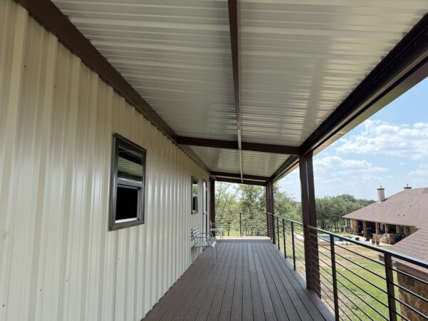 30x40 Custom Metal Building with Steel Balcony, Mezzanine and a Wraparound Porch.