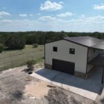 30x40 Custom Metal Building with Steel Balcony, Mezzanine and a Wraparound Porch.