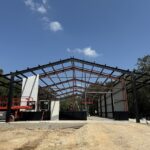30x40 Custom Metal Building with Steel Balcony, Mezzanine and a Wraparound Porch.