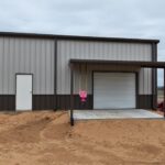 26x45 Red Iron Steel Building with Porch in Boyd, TX.