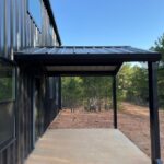 40x60 Custom Black Steel Building in Avinger, TX.