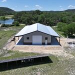 40x75 Metal Workshop with Custom Porch in Medina, TX.