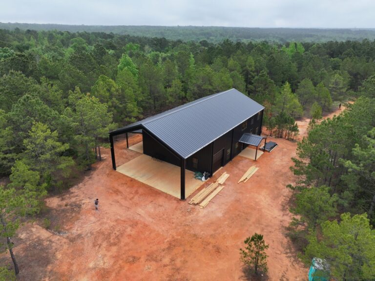 40x60 Custom Black Steel Building in Avinger, TX.