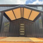 40x60 Custom Black Steel Building in Avinger, TX.