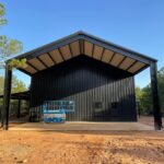 40x60 Custom Black Steel Building in Avinger, TX.