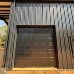 40x60 Custom Black Steel Building in Avinger, TX.