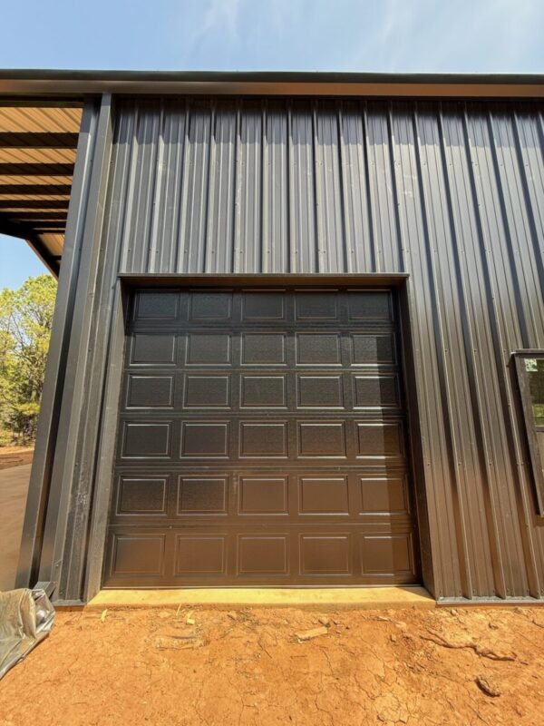 40x60 Custom Black Steel Building in Avinger, TX.