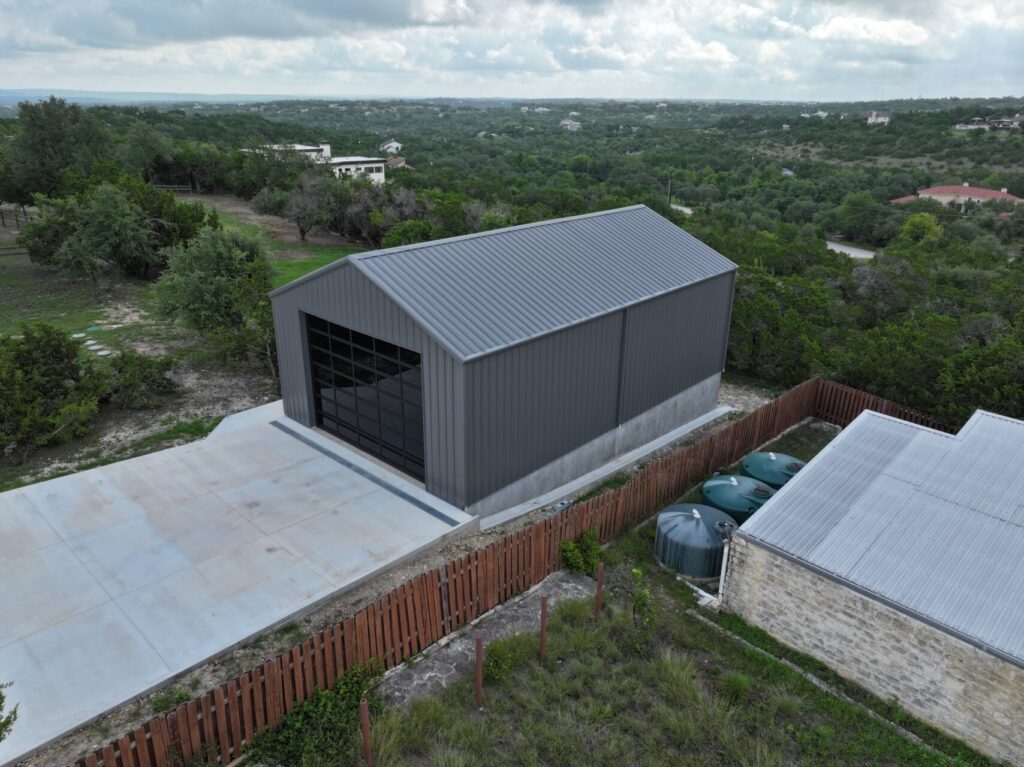30x50 Red Iron Bolt Up Metal Building in Dripping Springs, TX.