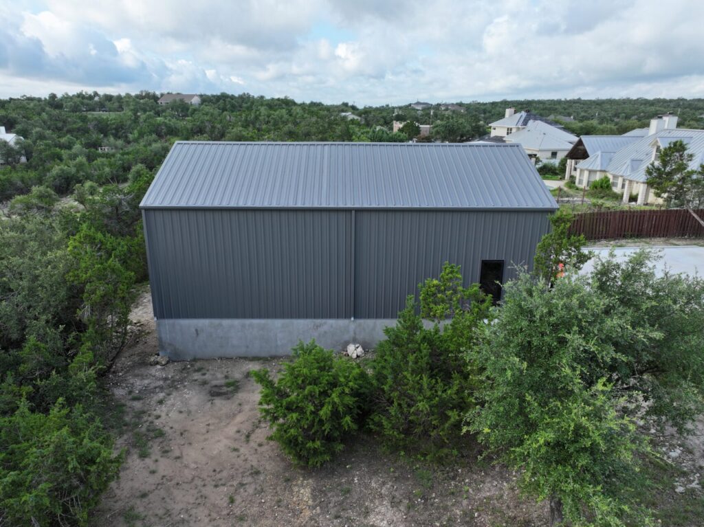 30x50 Red Iron Bolt Up Metal Building in Dripping Springs, TX.