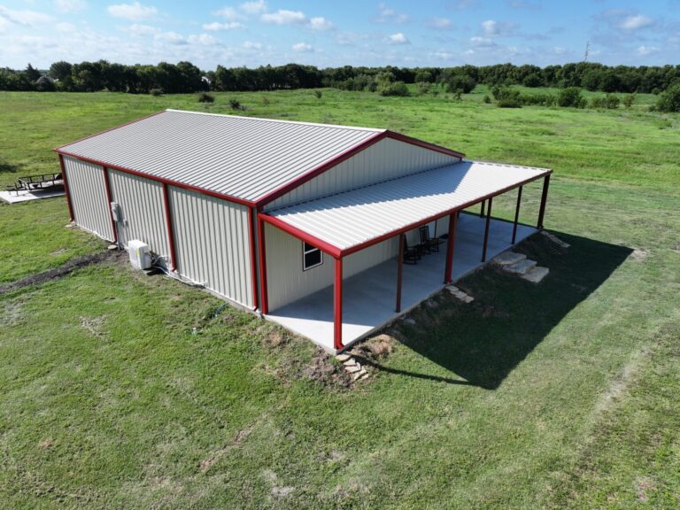 40x50 Red Iron Steel Building with Wraparound Porch in Kaufman, TX.