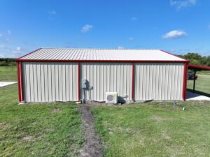40x50 Red Iron Steel Building with Wraparound Porch in Kaufman, TX.